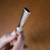 Bombilla de plata y oro